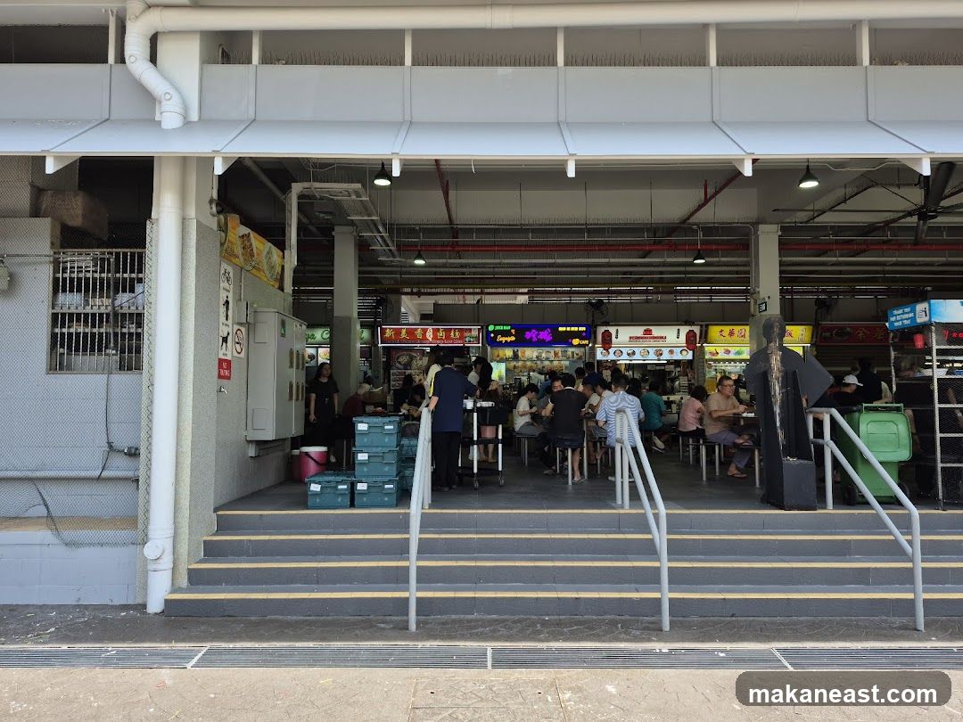 Hawker Centre with Food Stalls and Diners