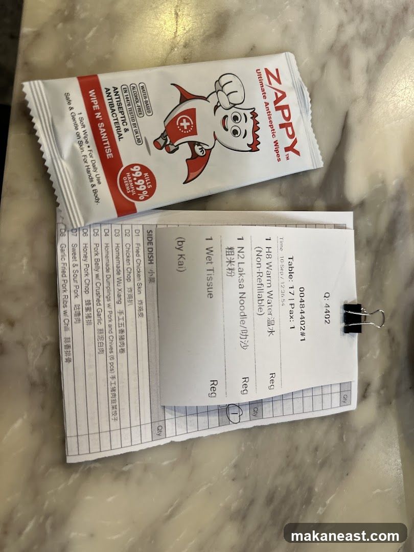 Restaurant Bill and Wet Wipes