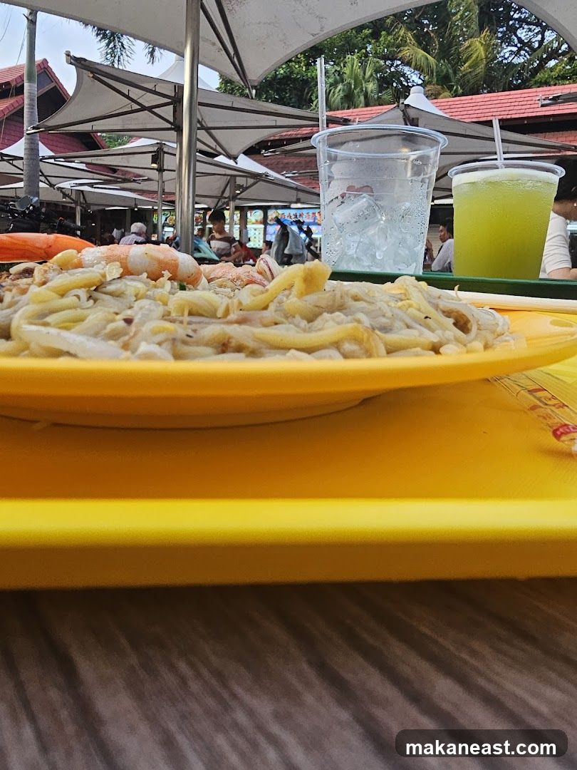 Noodles and Drinks at an Outdoor Food Court