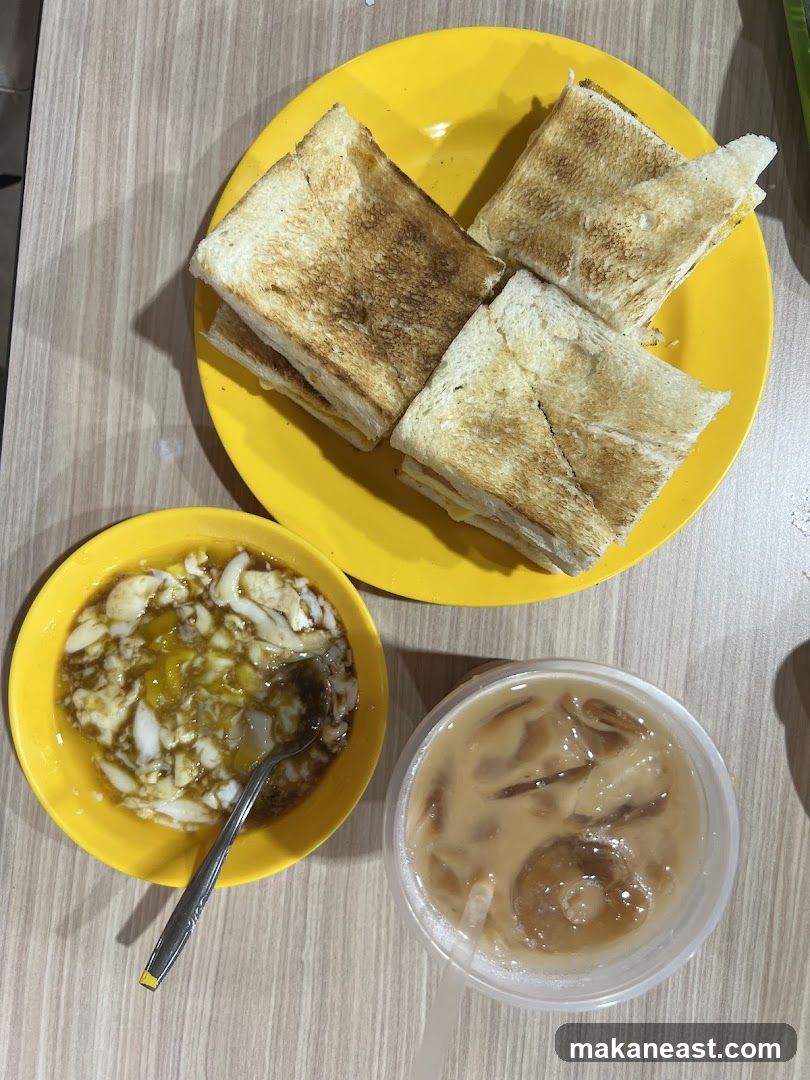 Toast with soft-boiled eggs and iced coffee