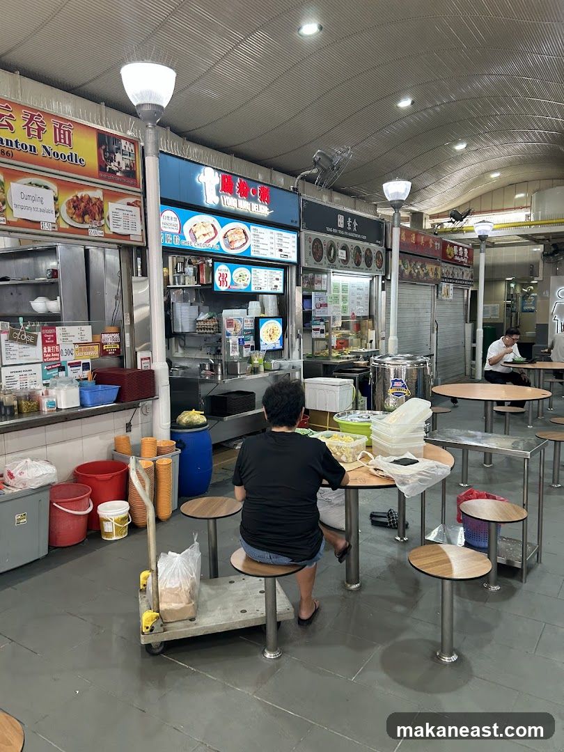 Food court with diners and food stalls