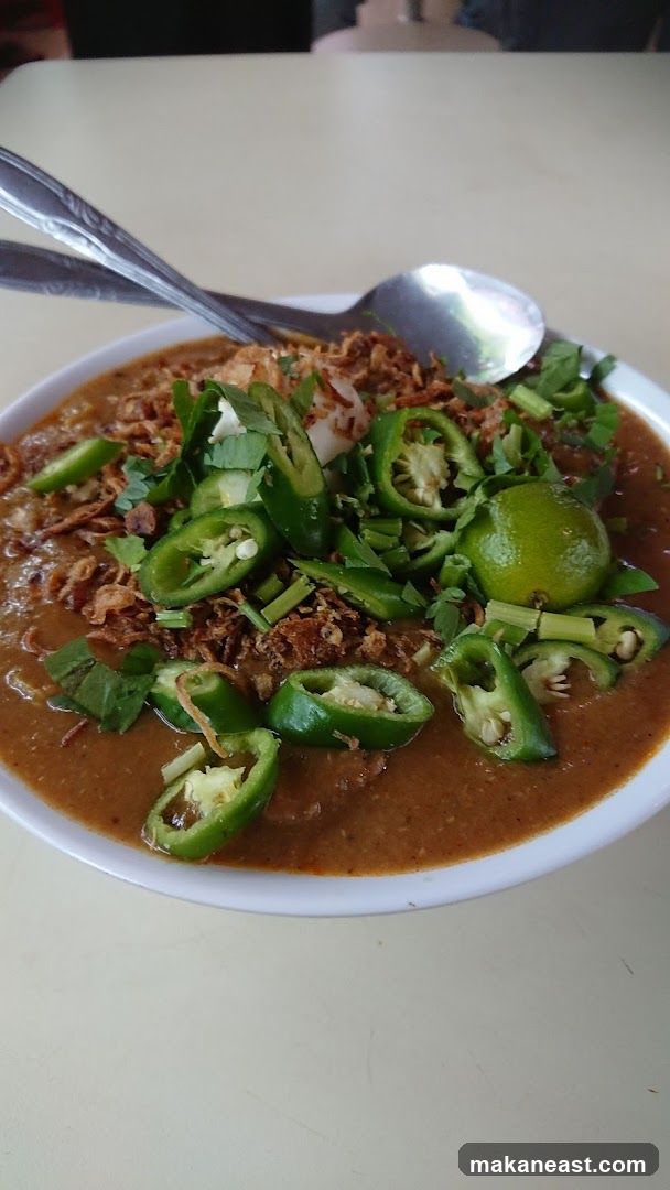 Bowl of food with chili and lime