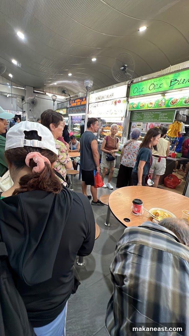 Busy Food Stall with Customers