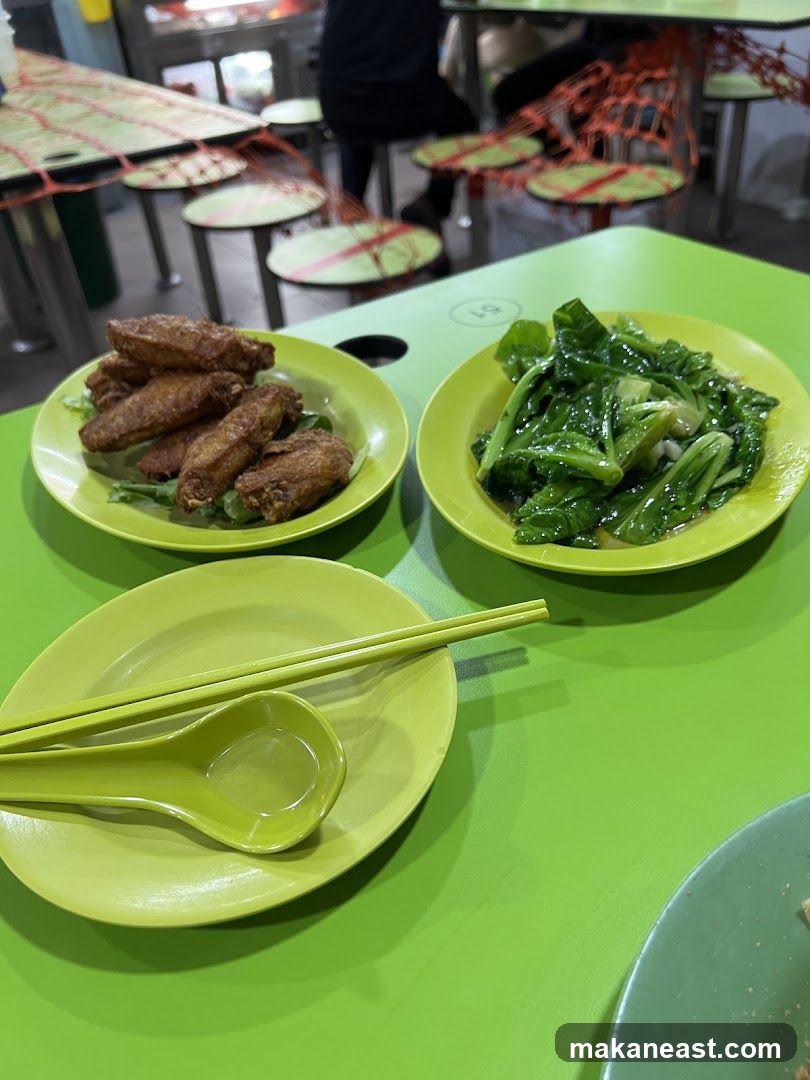 Fried Chicken Wings and Stir-fried Greens