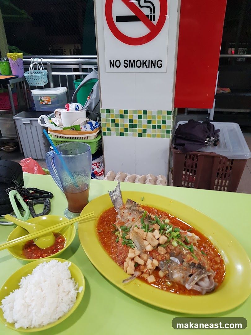 Steamed Fish with Rice and Sauce