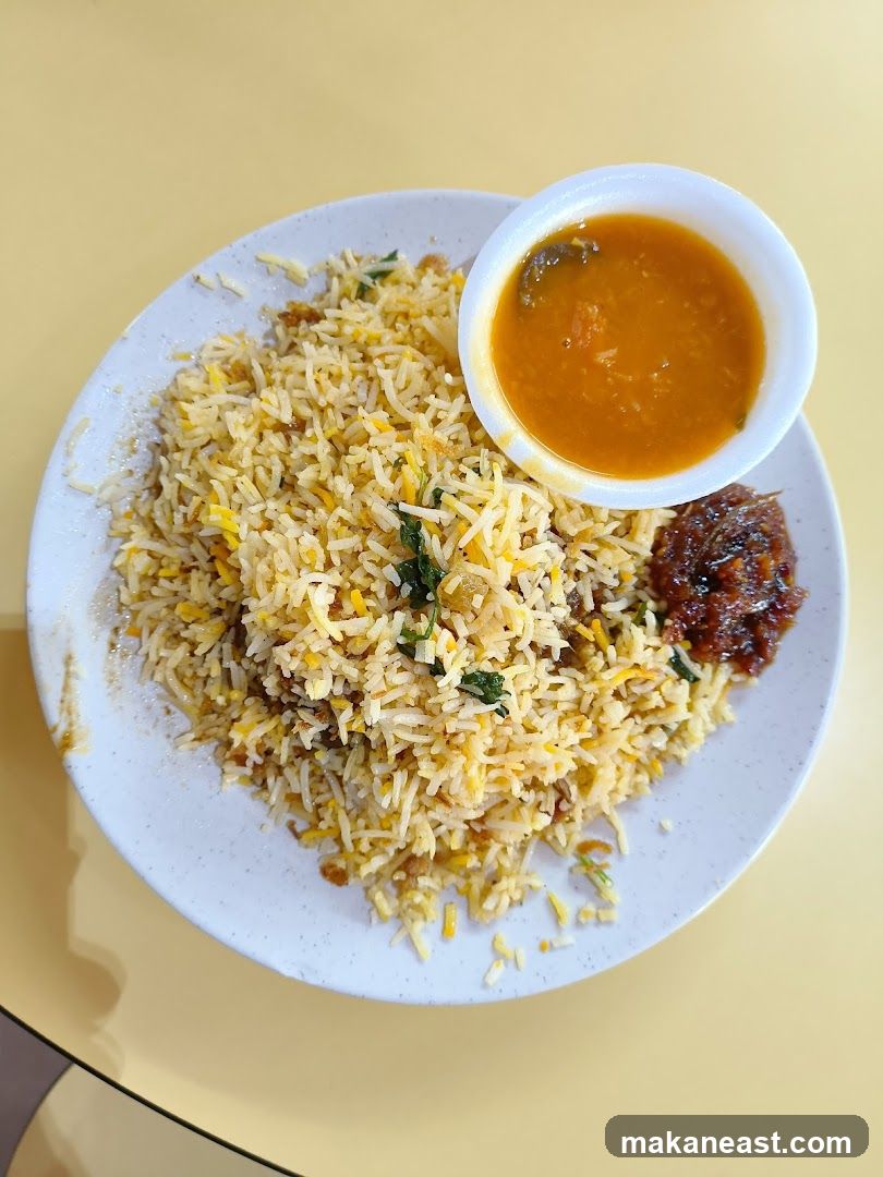 Biryani with Curry and Chutney