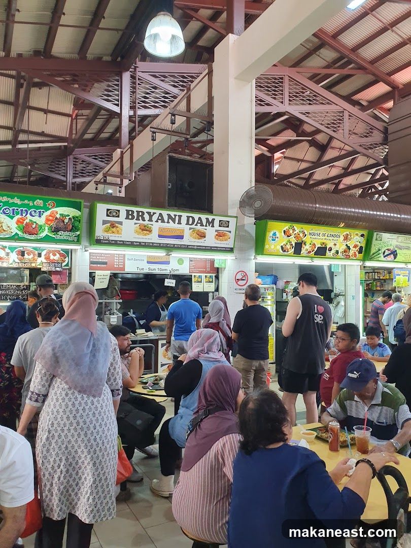 Food court with many stalls and patrons