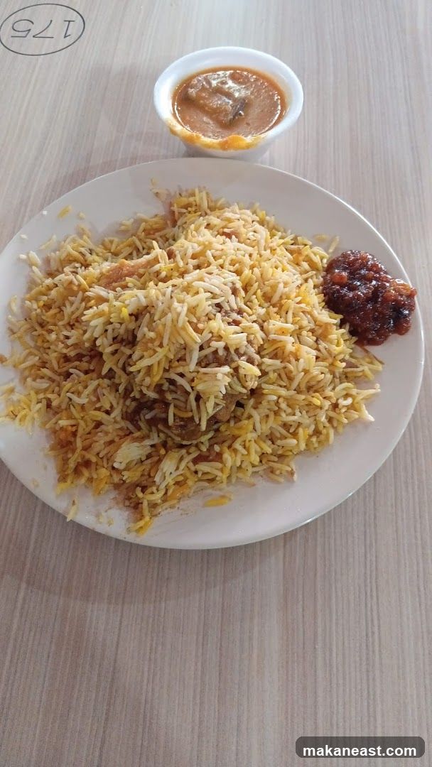 Biryani with Curry and Chutney