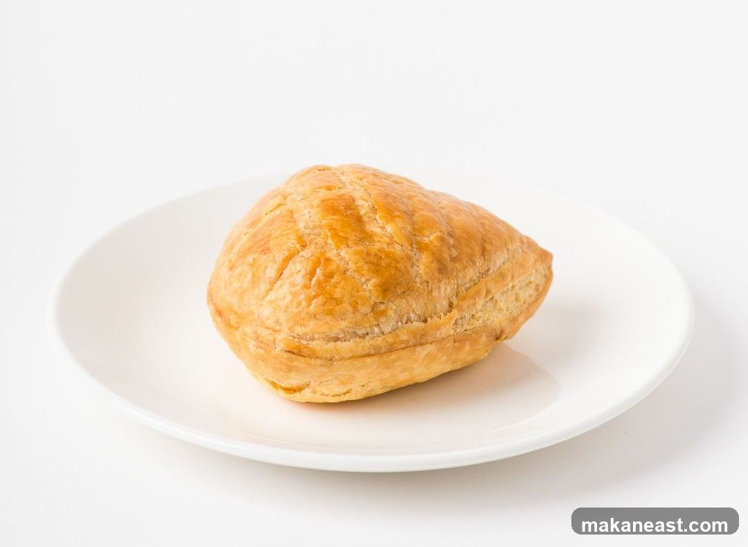 Golden Puff Pastry on a White Plate