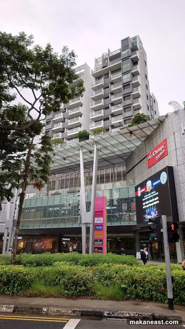 Modern Building with Shops and Digital Billboard
