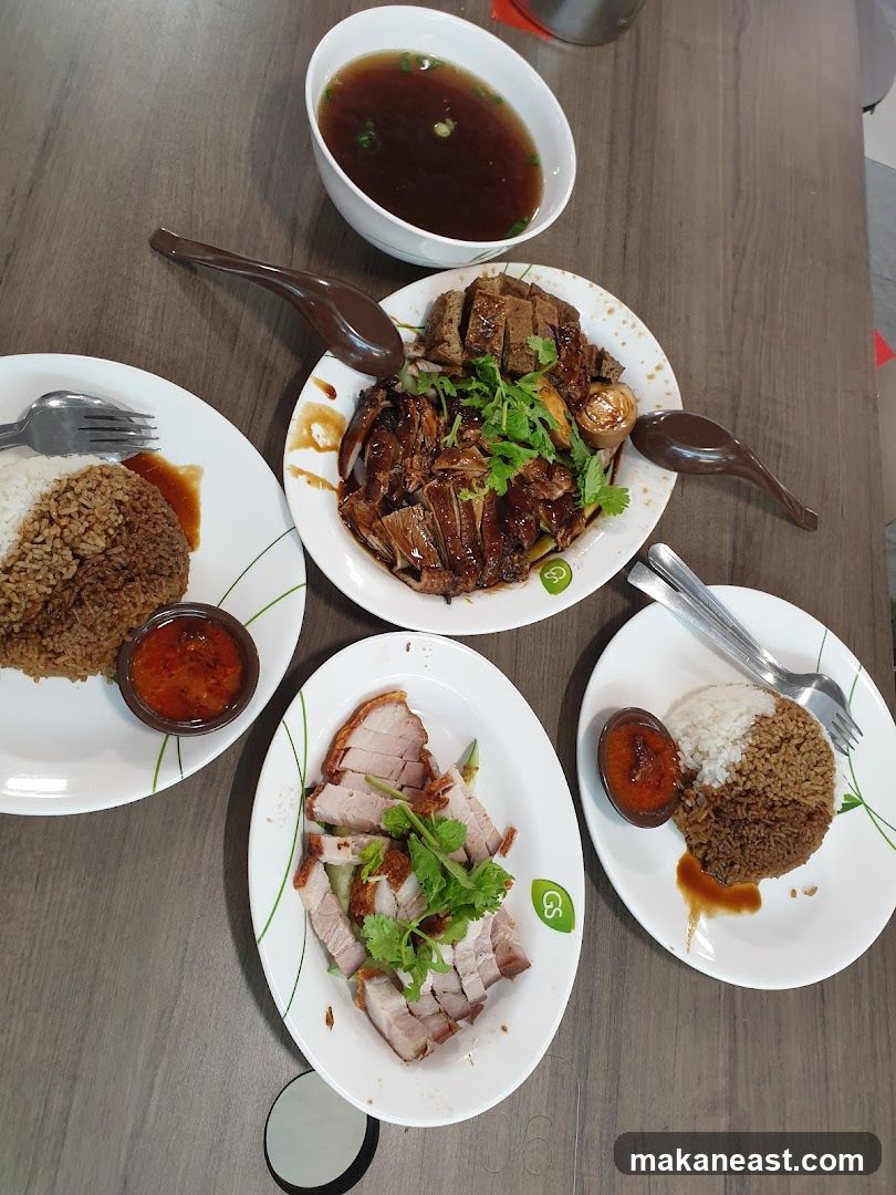 Plates of Roasted Meats and Rice