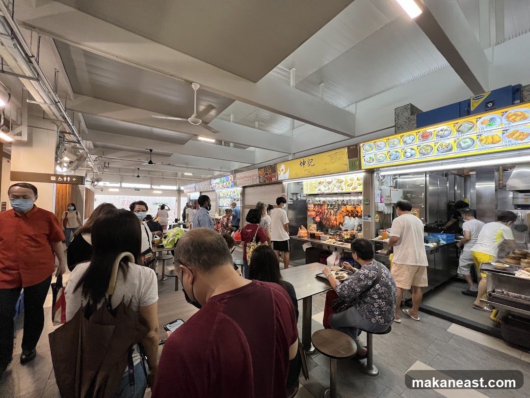 Busy Food Stall with Customers