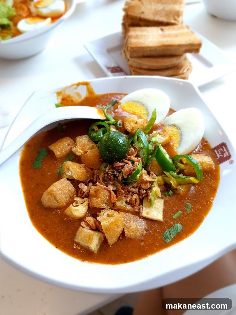 Bowl of Laksa with Toast