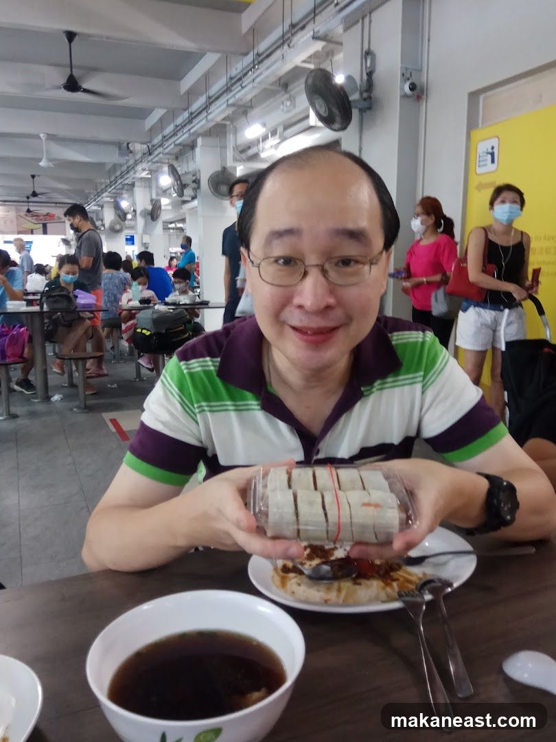 Man holding food at a food court