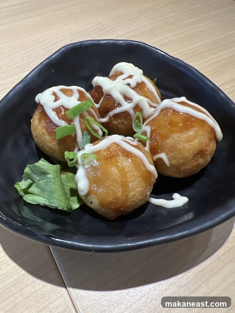Takoyaki with mayonnaise and green onions