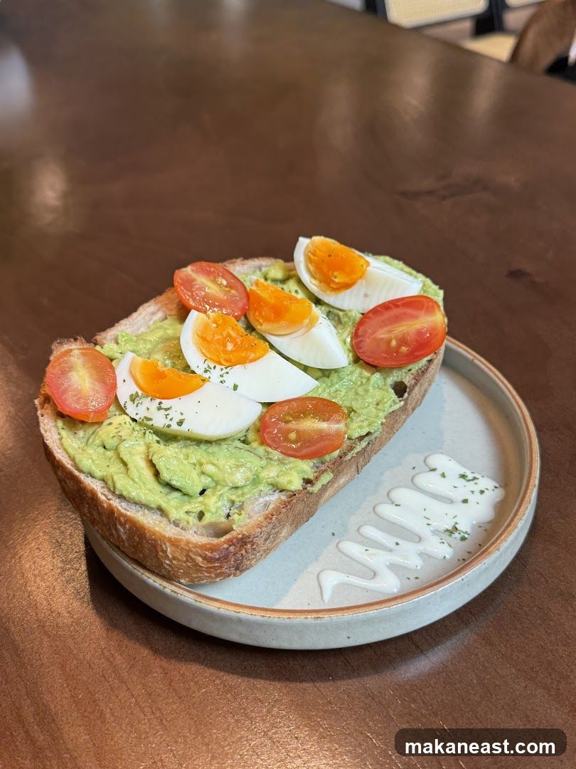 Avocado Toast with Eggs and Tomatoes