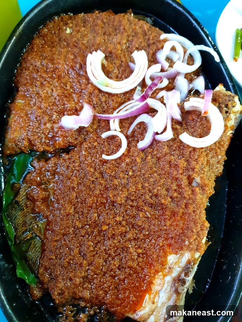Fried Fish with Spices and Onions