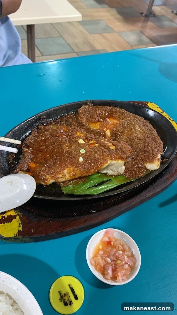 Sizzling Dish with Side Salad