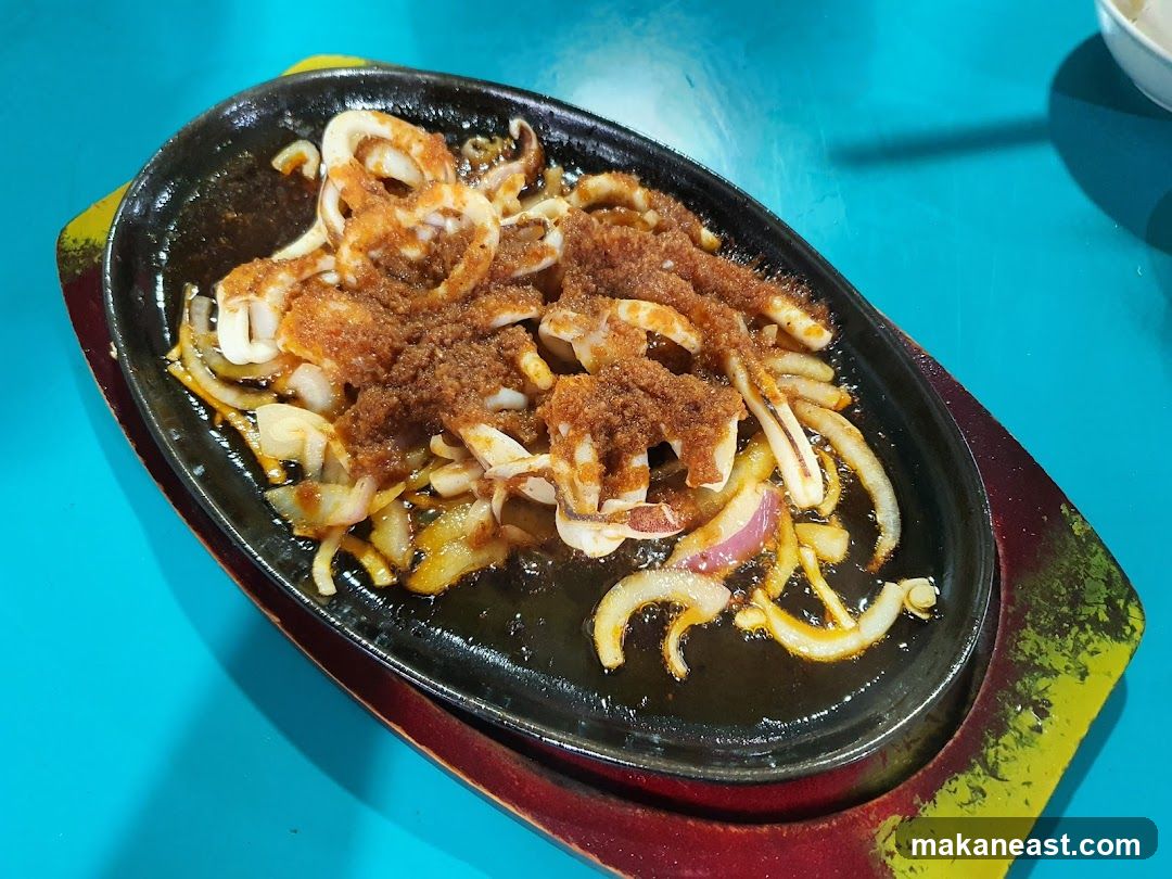 Sizzling Squid with Onions