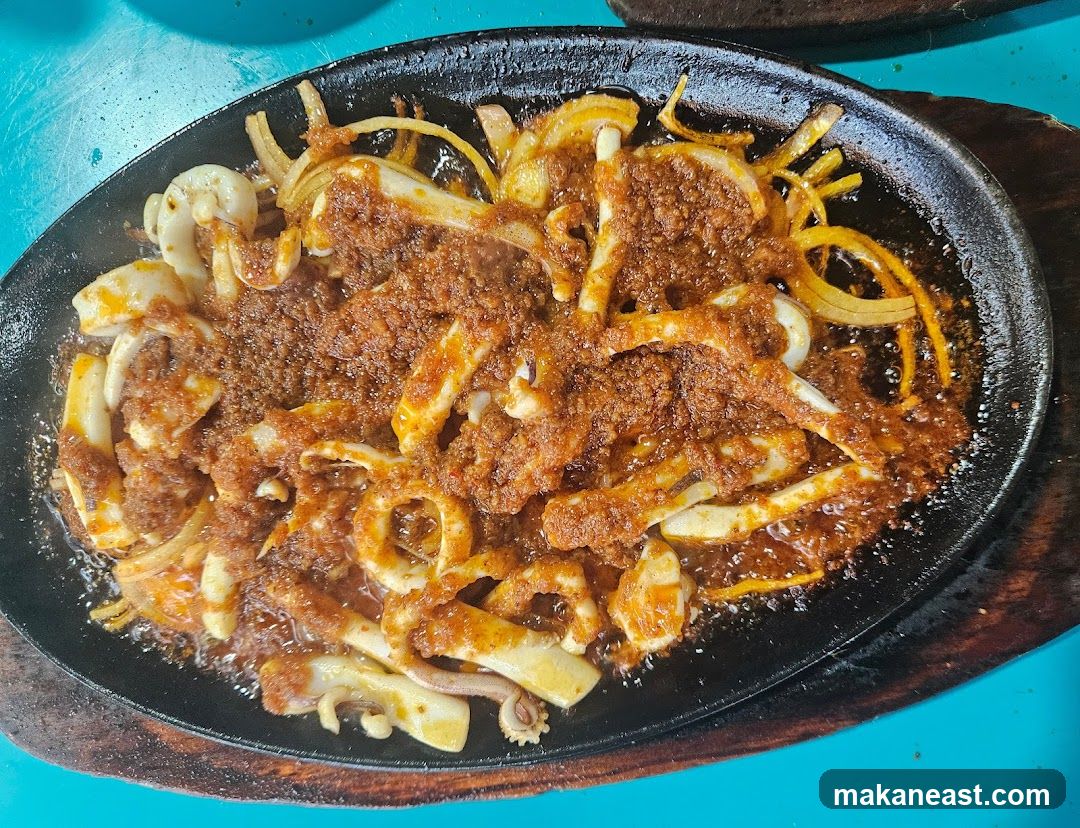 Sizzling Squid with Onions