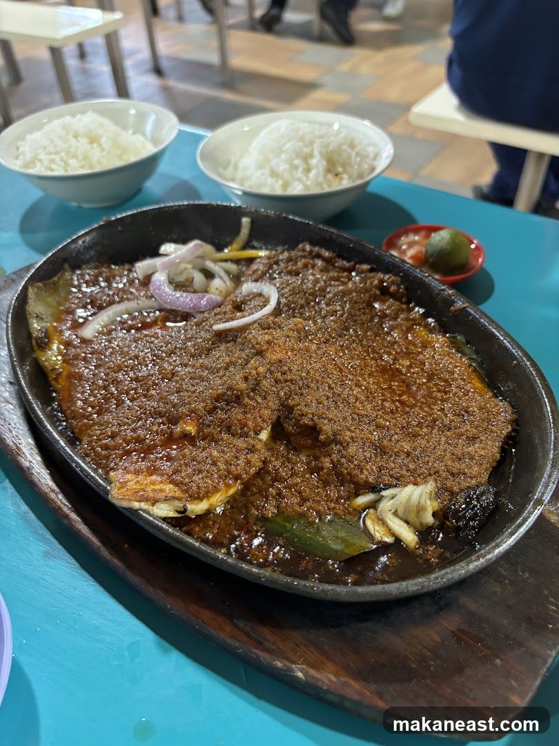 Sizzling Fish Dish with Rice