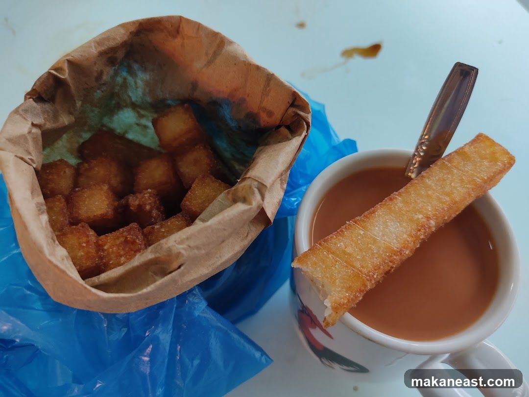 Fried bread cubes and tea