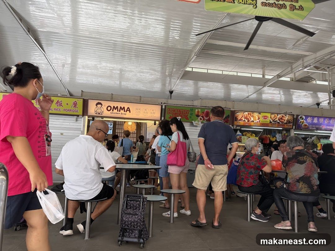 Food court with people dining and ordering