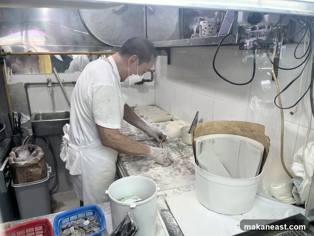 Baker preparing dough