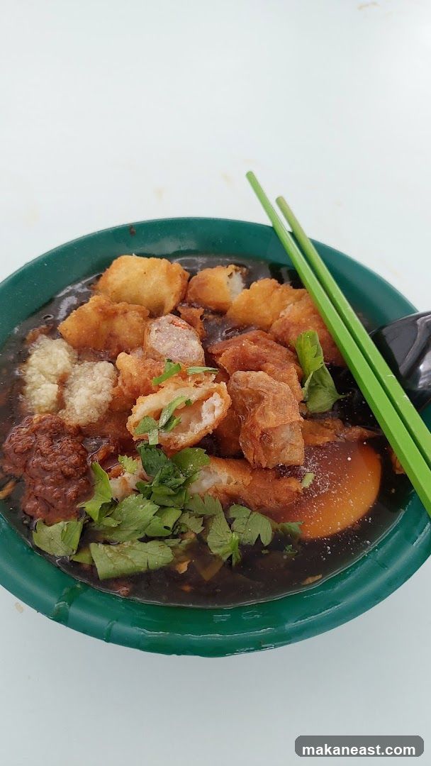 Bowl of Noodles with Fried Ingredients