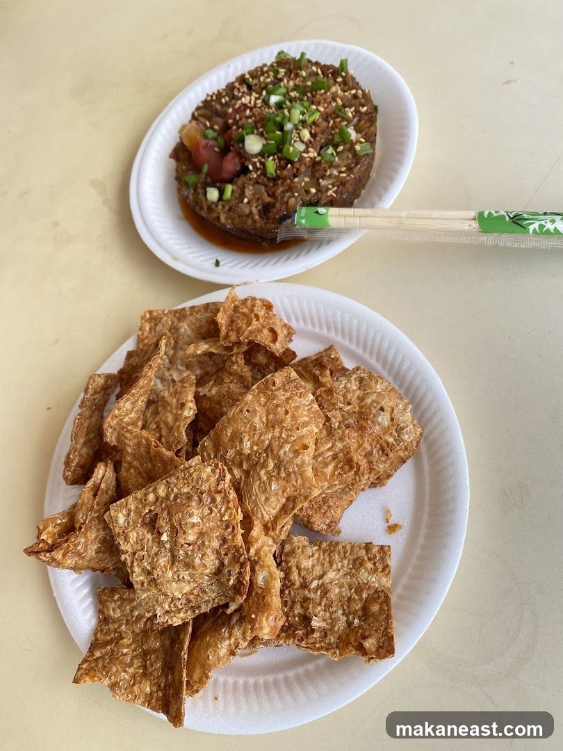 Savory Rice Dish and Crispy Snacks