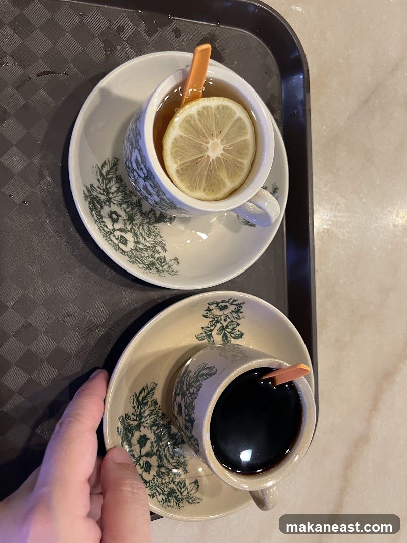 Two cups of drinks on a tray