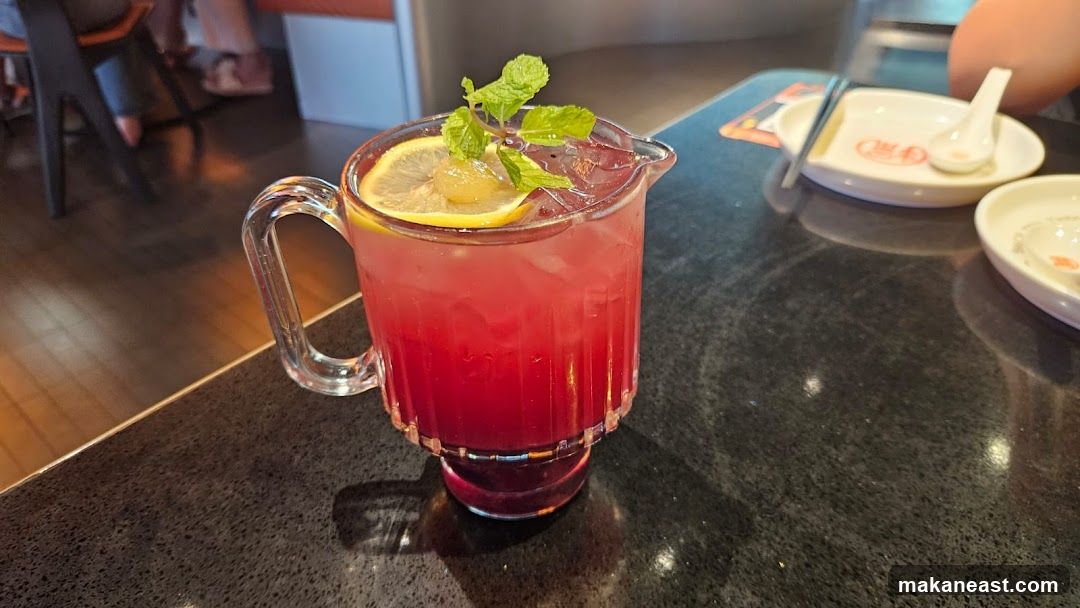 Pitcher of Red Drink with Lemon and Mint