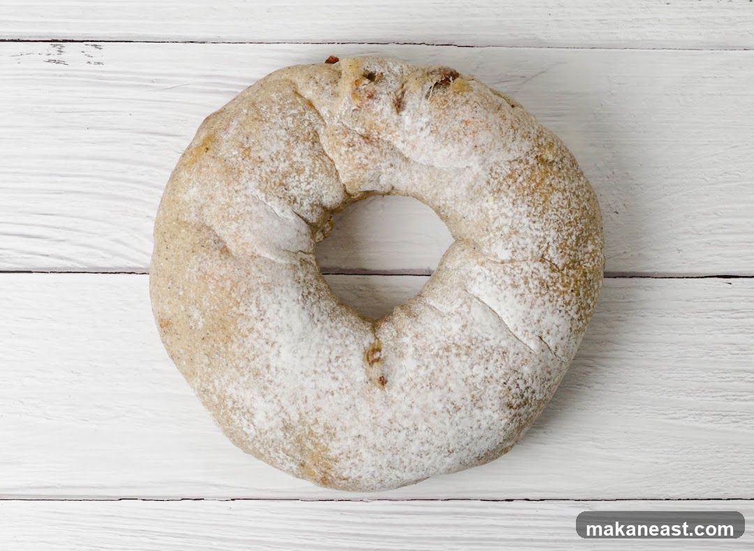 Ring-shaped bread dusted with flour