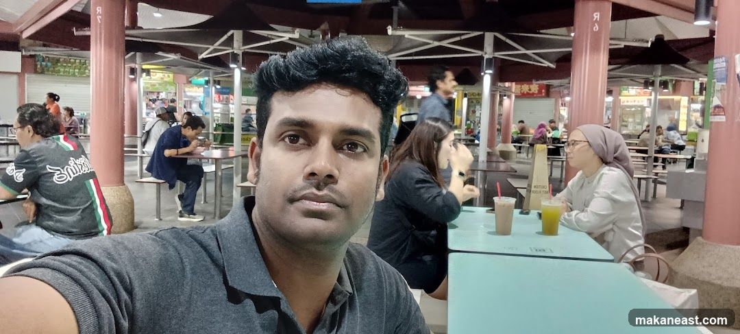 People eating at a food court