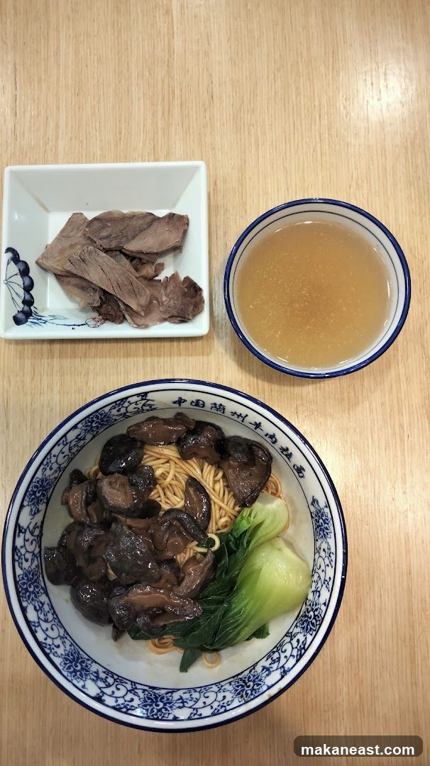 Noodle Dish with Side of Meat and Broth