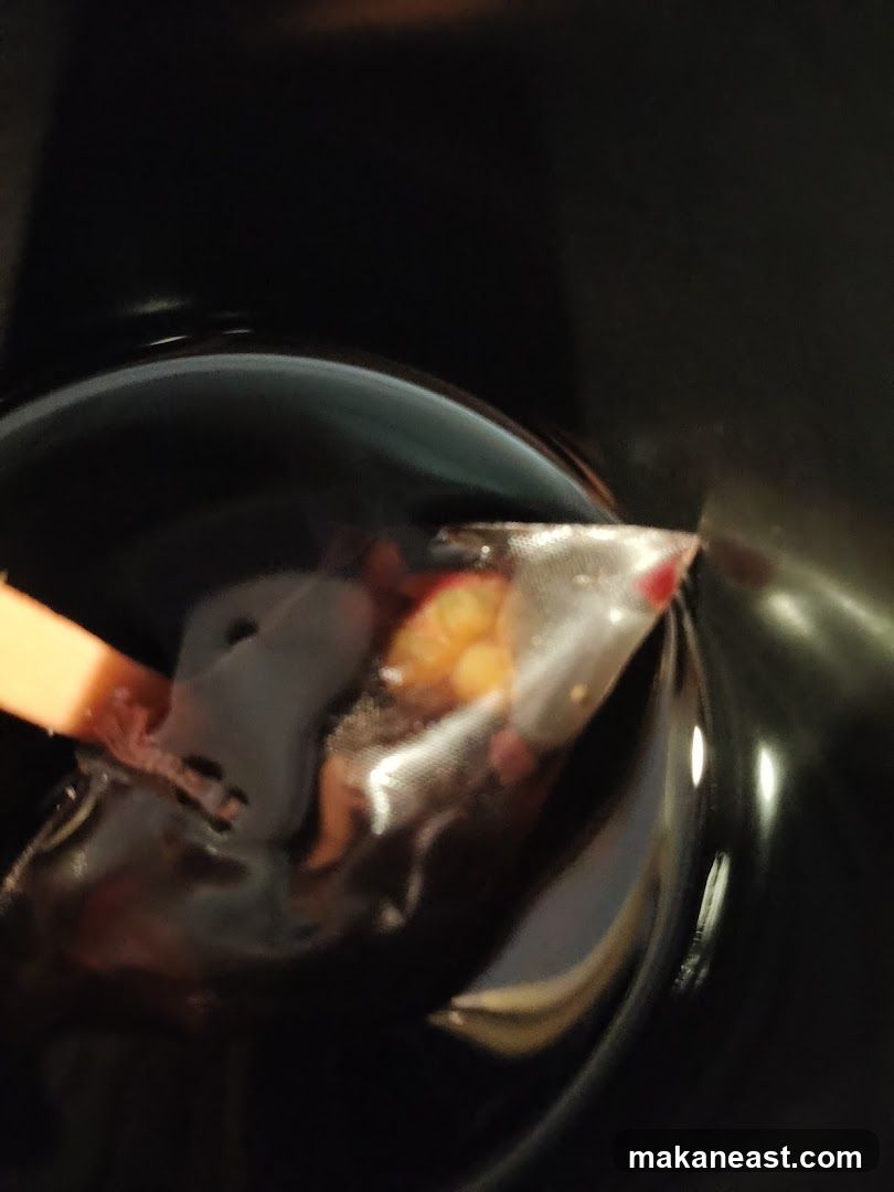 Close-up of a dessert in a dark bowl