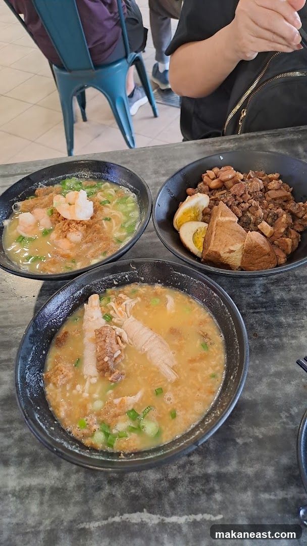 Three bowls of food on a table