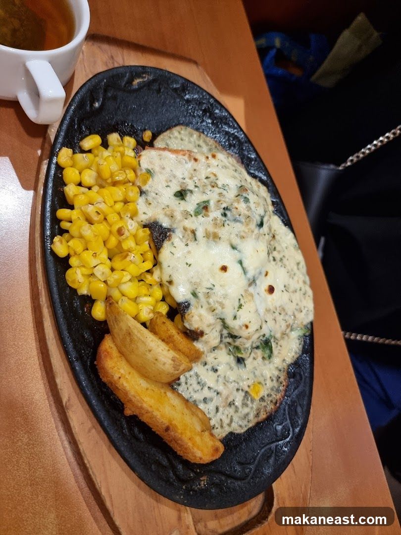 Sizzling Steak with Corn and Potato Wedges