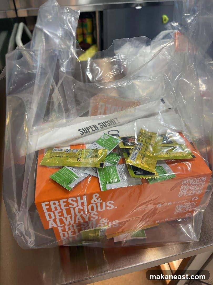 Takeout Bag with Sushi Box and Condiments