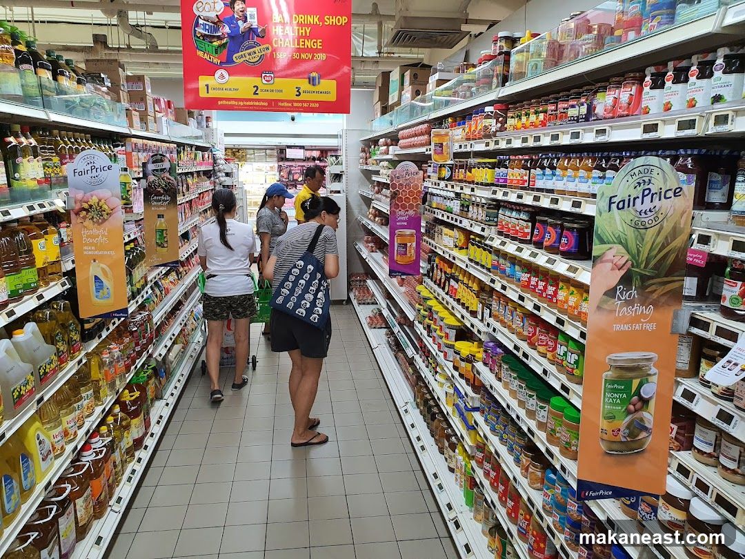 Supermarket aisle with promotional banner