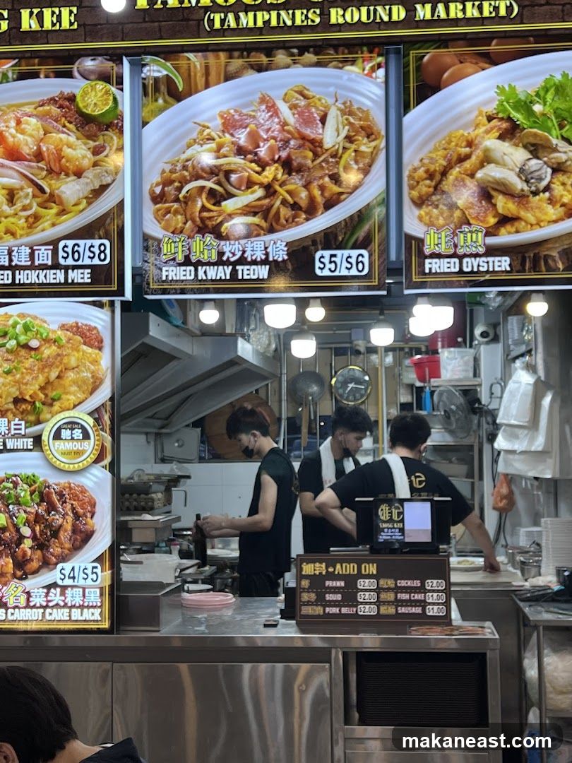 Food stall with menu and staff