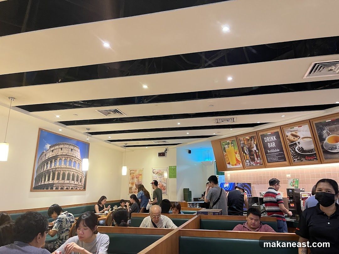 Restaurant Interior with Diners and Drink Bar