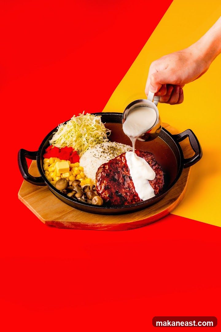 Hamburger steak with rice and sides