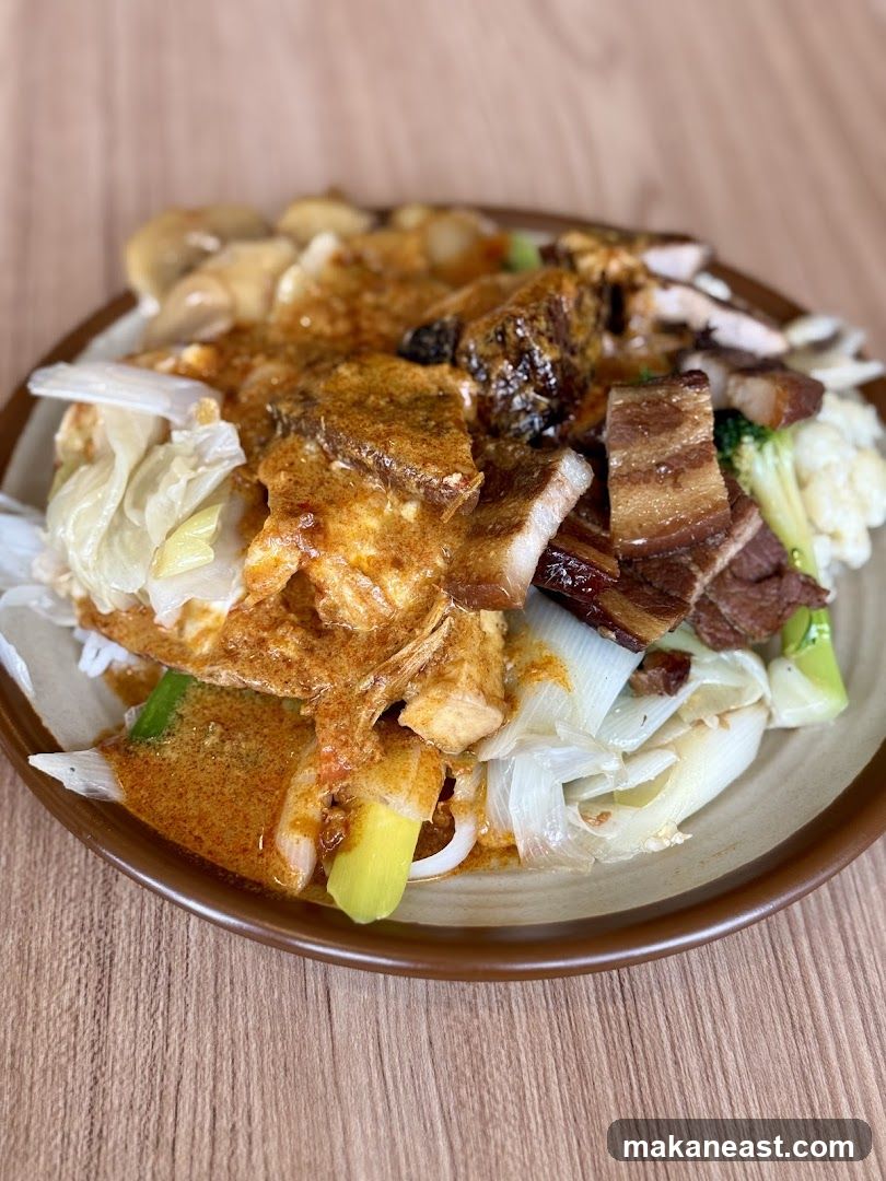 Plate of food with meat and vegetables