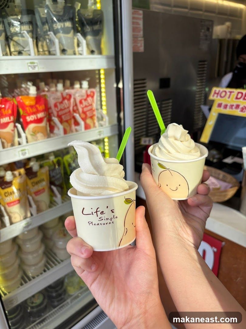 Two cups of soft serve ice cream