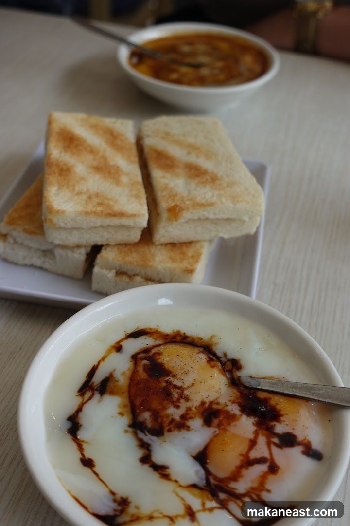Soft-boiled eggs with toast and curry
