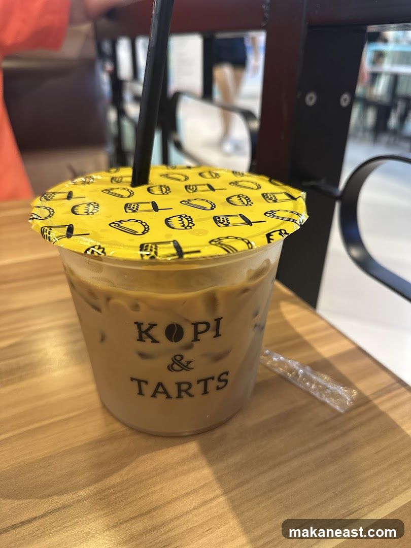 Iced Coffee with Kopi & Tarts Logo