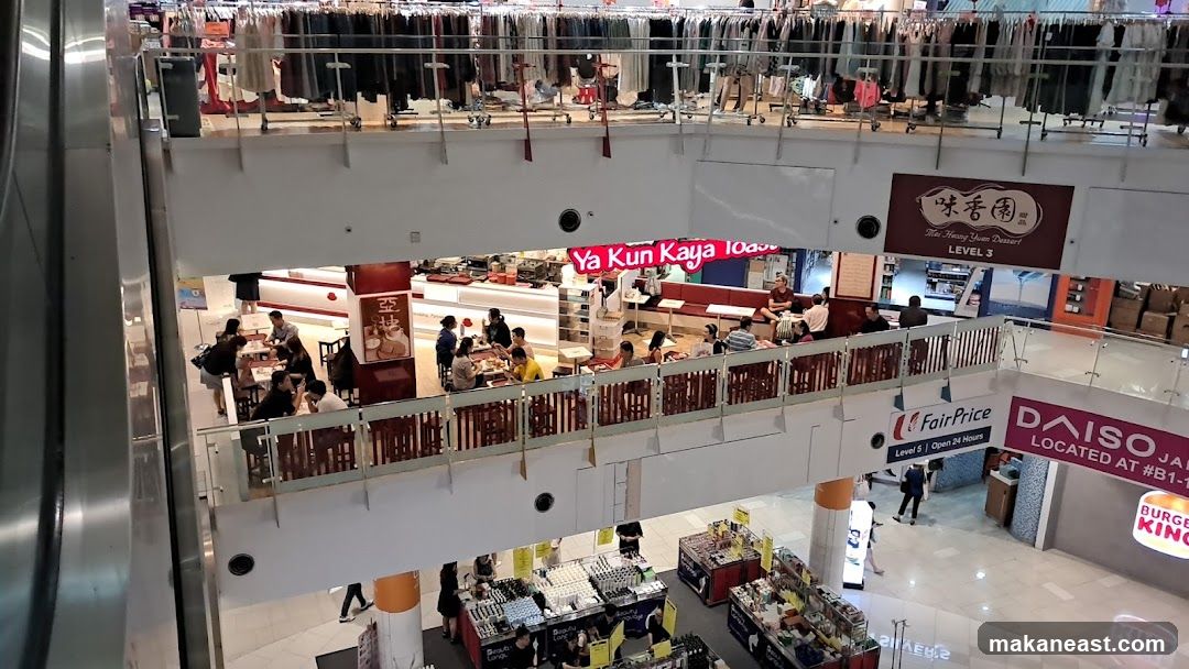 Mall Interior with Shops and Dining Area
