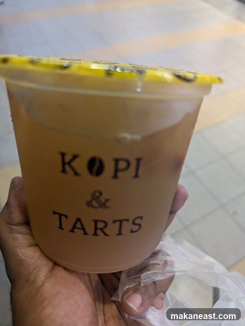 Iced Drink with "Kopi & Tarts" Logo