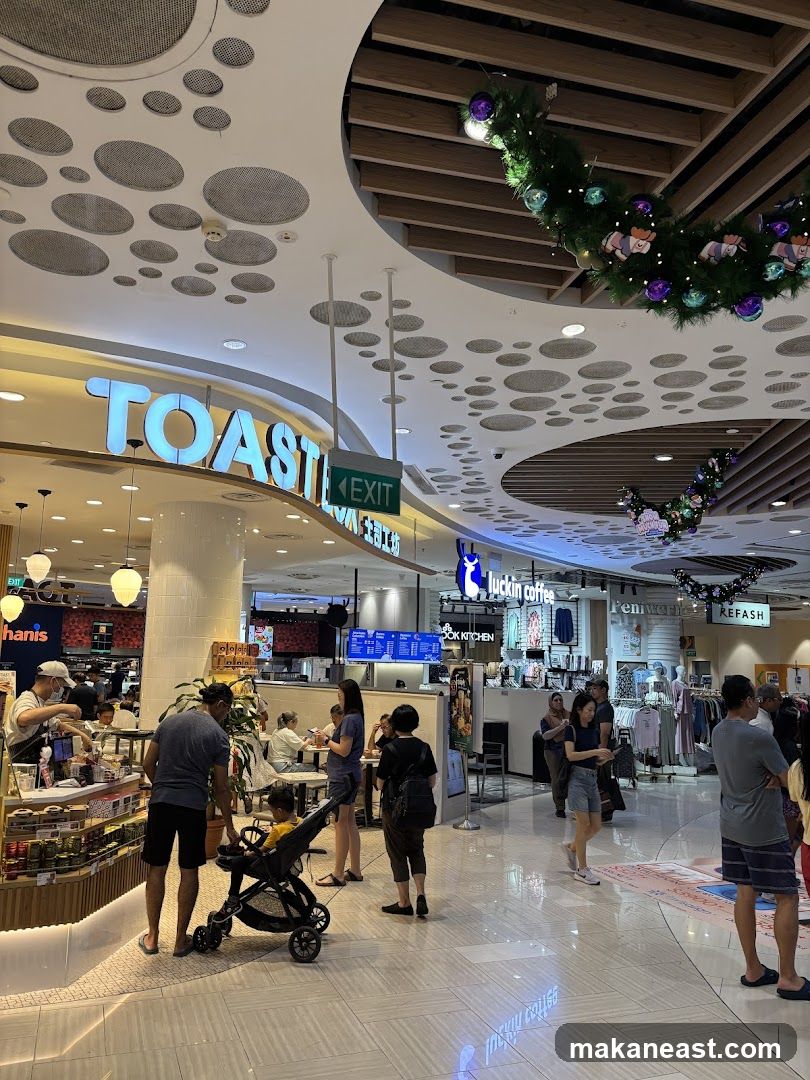 Indoor Mall Scene with Shops and People